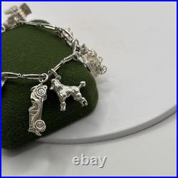 (2061)Vintage Sterling Silver Charm Bracelet