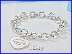 $310 Return To Tiffany & Co Silver Heart Tag Charm Bracelet 7.5 /35 gr 19081