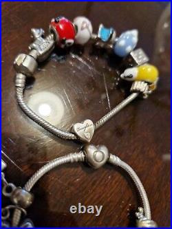 5 Pandora Silver bracelets with charms used