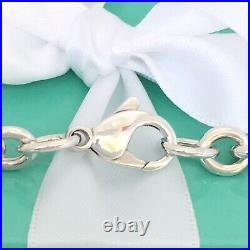 7.5 Please Return To Tiffany & Co Sterling Silver Oval Tag Charm Bracelet