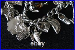 925 Silver Charm Bracelet Belcher Link And Thirty Five Charms A Vintage Stunner