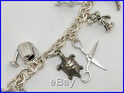 925 Sterling Silver 7.5 Charm Bracelet with 15 Various Charms (RF1075)