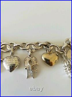 925 Sterling Silver Links Of London Charm Bracelet with 11 charms