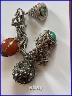 A Berber Kabyle Silver Bracelet, 4 stunning Pendant Charms 75 g total weight A Berber Kabyle Silver Bracelet, 4 stunning Pendant Charms 75 g total weight
