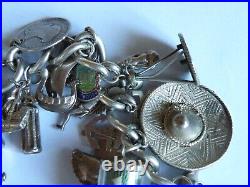 A Vintage Solid Silver Ladies Charm Bracelet With 31 Charms