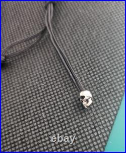 Alexander McQueen Skull Charm Drawstring Bracelet Alexander McQueen Skull Charm Drawstring Bracelet