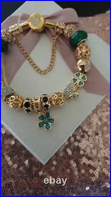 Authentic Pandora Bracelet Gold Signature Clap 20 cm & Gold Charms +Pandora Box Authentic Pandora Bracelet Gold Signature Clap 20 cm & Gold Charms +Pandora Box