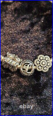 Authentic Pandora Sterling Silver Bracelet and Charms