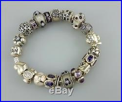Authentic Pandora silver bracelet with 21 authentic silver charms purple colors