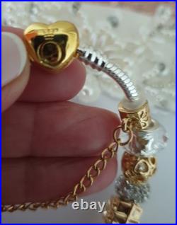 Authentic Silver Pandora Bracelet Gold Heart & Gold Charms + gift Box. 20 cms Authentic Silver Pandora Bracelet Gold Heart & Gold Charms + gift Box. 20 cms
