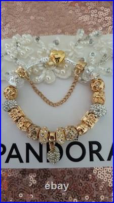 Authentic Silver Pandora Bracelet Gold Heart & Gold Charms + gift Box. 20 cms Authentic Silver Pandora Bracelet Gold Heart & Gold Charms + gift Box. 20 cms