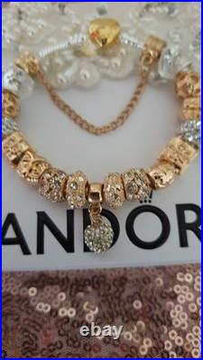 Authentic Silver Pandora Bracelet Gold Heart & Gold Charms + gift Box. 20 cms Authentic Silver Pandora Bracelet Gold Heart & Gold Charms + gift Box. 20 cms