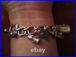 Authentic Swiss Made Burberry Lady Sterling Silver Charm Bracelet Watch BU5200