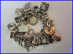 Beautiful Vintage Silver Charm Bracelet. 44 Charms In Total. 115g