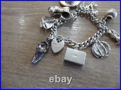 Beautiful Vintage Solid Silver Charm Bracelet With 11 Charms