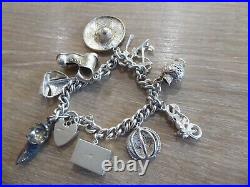 Beautiful Vintage Solid Silver Charm Bracelet With 11 Charms