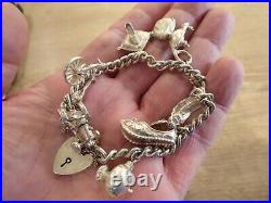 Beautiful Vintage Solid Silver Charm Bracelet With 8 Charms