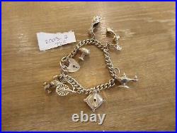 Beautiful Vintage Solid Silver Charm Bracelet With 8 Charms