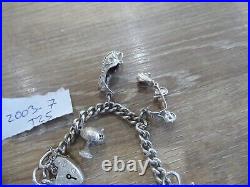 Beautiful Vintage Solid Silver Charm Bracelet With 8 Charms