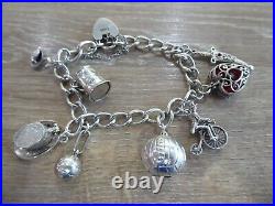 Beautiful Vintage Solid Silver Charm Bracelet With 9 Charms