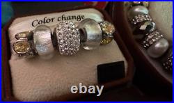 Bella Perlina Silver toned Charm Bracelet and sets of charms Bella Perlina Silver toned Charm Bracelet and sets of charms