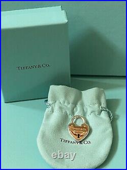 Brand new Tiffany & Co Rose Gold / Sterling Silver Love Lock Heart Charm