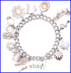 Charm Silver Vintage Bracelet 12 Charms Bible Hat Maple Leaf 44.2 Grams