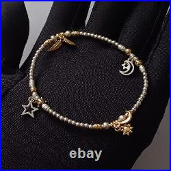 ChloBo Gold And Silver Multi Charm Sun And Moon Stars And Feathers Bracelet