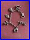 Dower-And-Hall-Silver-Charm-Bracelet-With-6-Charms-01-oe