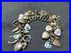 Edwardian-Victorian-Sterling-Curb-Ornate-Bracelet-with-34-Hearts-Charms-7-3-4-01-fhfi