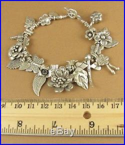 Flower, dragonfly and leaf chunky charm bracelet. Fine & sterling silver