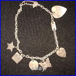 GUCCI. 925 STERLING SILVER TRADEMARK LOGO MULTI-CHARM Bracelet GUCCI. 925 STERLING SILVER TRADEMARK LOGO MULTI-CHARM Bracelet