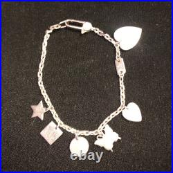 GUCCI. 925 STERLING SILVER TRADEMARK LOGO MULTI-CHARM Bracelet GUCCI. 925 STERLING SILVER TRADEMARK LOGO MULTI-CHARM Bracelet