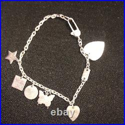 GUCCI. 925 STERLING SILVER TRADEMARK LOGO MULTI-CHARM Bracelet GUCCI. 925 STERLING SILVER TRADEMARK LOGO MULTI-CHARM Bracelet