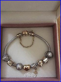 Genuine And Authentic Pandora Silver Bracelet With Gold Clasp And Charms