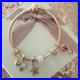 Genuine-PANDORA-Bracelet-in-Rose-Gold-6-PANDORA-Rose-Gold-Charms-20-cm-Box-01-fmx