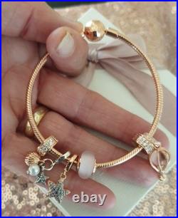 Genuine PANDORA Bracelet in Rose Gold & 6 PANDORA Rose Gold Charms 20 cm + Box Genuine PANDORA Bracelet in Rose Gold & 6 PANDORA Rose Gold Charms 20 cm + Box