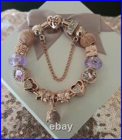Genuine Pandora Bracelet Rose Gold With charms Beads shown. 19 cms long + Box Genuine Pandora Bracelet Rose Gold With charms Beads shown. 19 cms long + Box