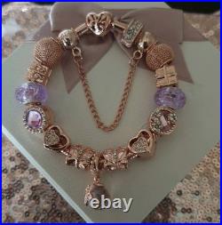Genuine Pandora Bracelet Rose Gold With charms Beads shown. 19 cms long + Box Genuine Pandora Bracelet Rose Gold With charms Beads shown. 19 cms long + Box