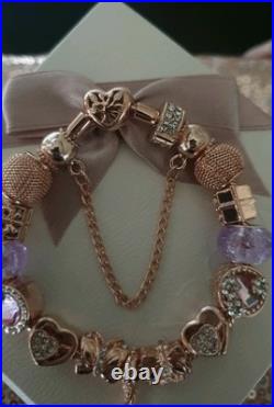 Genuine Pandora Bracelet Rose Gold With charms Beads shown. 19 cms long + Box Genuine Pandora Bracelet Rose Gold With charms Beads shown. 19 cms long + Box