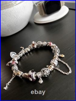 Genuine Pandora Bracelet complete with charms
