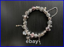Genuine Pandora Bracelet complete with charms