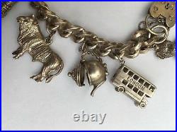 Genuine STERLING SILVER bracelet with 12 charms Excellent condition