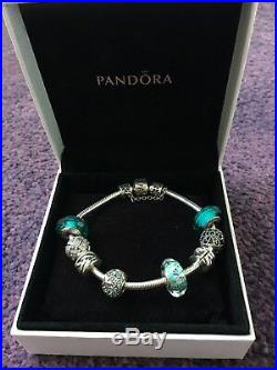 Genuine silver Pandora bracelet with 6 charms, 2 Stoppers, Safety Clasp