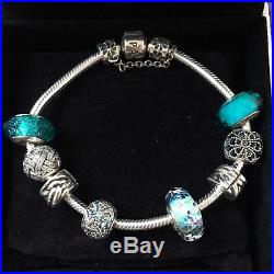Genuine silver Pandora bracelet with 6 charms, 2 Stoppers, Safety Clasp