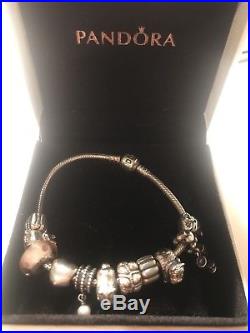 Genuine silver pandora bracelet with charms