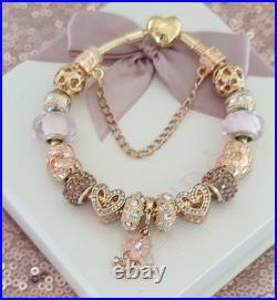 Gold Pandora Bracelet Heart Clasp. & Gold Charms with Pandora gift Box. 19 cms