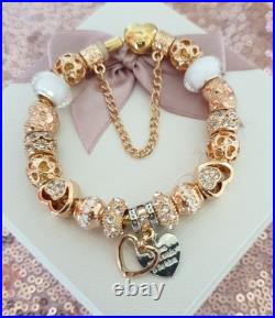 Gold Pandora Bracelet Heart Clasp. & Gold Charms with Pandora gift Box. 19 cms Gold Pandora Bracelet Heart Clasp. & Gold Charms with Pandora gift Box. 19 cms