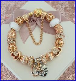 Gold Pandora Bracelet Heart Clasp. & Gold Charms with Pandora gift Box. 19 cms Gold Pandora Bracelet Heart Clasp. & Gold Charms with Pandora gift Box. 19 cms