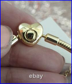 Gold Pandora Bracelet Heart Clasp. & Gold Charms with Pandora gift Box. 19 cms